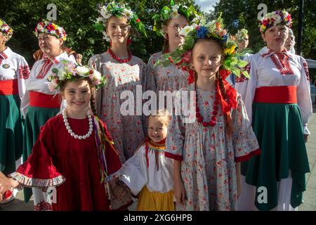 Moscow, Russia. 6th of July, 2024. People in traditional Belarusian costumes take part in the celebration of the Belarusian holiday 'Kupalle' in Ostankino Park in Moscow, Russia. Kupalle or Ivana Kupala Day, also known as Ivana-Kupala or Kupala Night, is a traditional pagan holiday folk celebration in eastern Slavic cultures. Girls create and wear flower wreaths and perform various rituals. Initially, Ivana-Kupala was a pagan fertility rite that was also connected to the celebration of the summer solstice when nights are the shortest Stock Photo