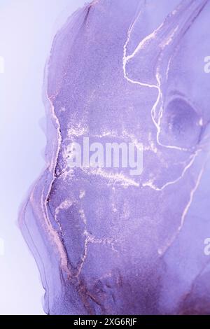 A close-up shot of a vibrant lilac abstract painting featuring intricate silver vein-like patterns against a pastel background Stock Photo