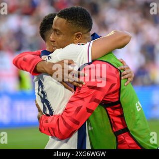 Düsseldorf, Germany. 6th July, 2024.Düsseldorf, Germany. 6th July 2024. 06 Jul 2024 - England v Switzerland - UEFA Euro 2024 Championships - Quarter Final - Düsseldorf. Trent Alexander-Arnold is congratulated by Ezri Konsa after scoring the final penalty in the shootout against Switzerland. Picture : Mark Pain / Alamy Live News Stock Photo