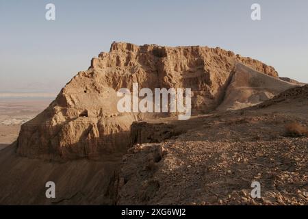 Masada, left, King Herod the Great's northern Palace, right, the ramp  Roman soldiers built to conquer the fortress in the Judean Desert over Dead Sea Stock Photo