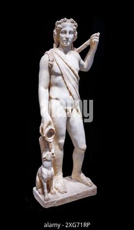 A Roman statue of the Greek god Dionysus, also known as   Bacchus. Marble. 2nd cen, AD. from Aldaya, Valencia, Spain. Stock Photo