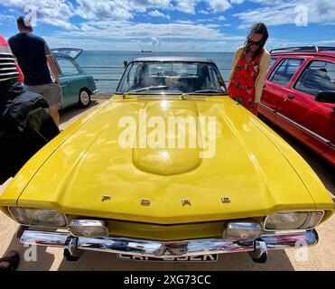 Penzance, Cornwall, UK. 7th July, 2024. UK Weather: Ford Capri shines at Rotary club vintage car event in Sunny Penzance, Cornwall. Credit: nidpor/Alamy Live News Stock Photo