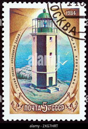 USSR - CIRCA 1984: A stamp printed in USSR from the 'Lighthouses' 3rd issue shows Kronotsky lighthouse Stock Photo