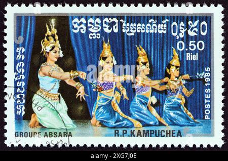 KAMPUCHEA - CIRCA 1985: A stamp printed in Kampuchea from the 'Traditional Dances' issue shows Absara group Stock Photo