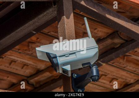 IP CCTV camera install on pole have water proof cover to protect camera is home security system concept. Stock Photo