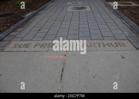 Prince Arthur Street name sign embossed on the sidewalk in downtown Montreal, Quebec, Canada Stock Photo