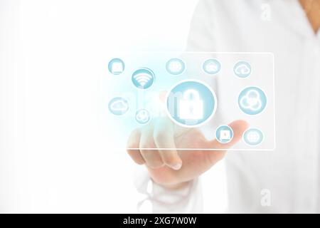 Cyber security concept business woman touching lock icon on virtual screen protect personal data Stock Photo