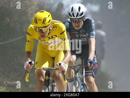 Slovenian Tadej Pogacar of UAE Team Emirates wearing the yellow jersey of leader in the overall ranking and Danish Jonas Vingegaard of Team Visma-Lease a Bike pictured in action during stage 9 of the 2024 Tour de France cycling race, from Troyes to Troyes, France (199 km) on Sunday 07 July 2024. The 111th edition of the Tour de France starts on Saturday 29 June and will finish in Nice, France on 21 July.  BELGA PHOTO POOL JAN DE MEULENEIR Stock Photo