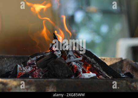 Burning coals in the barbecue. Close up. Stock Photo