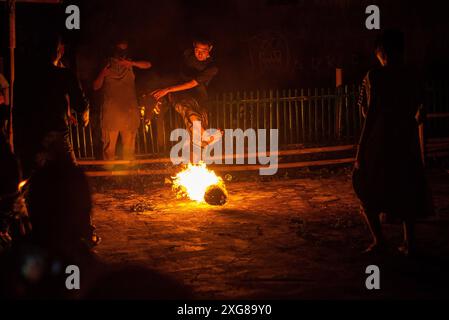 FIRE SOCCER GAME People play fire soccer in Bandung, West Java, Indonesia July 7, 2024. The fire soccer game is held to welcome the arrival of the Islamic New Year 1 Muharram 1446 Hijri. IMAGO/KHAIRIZAL MARIS Bandung West Java Indonesia Copyright: xKharizalxMarisxKhairizalxMarisx FIRE SOCCER GAME 9 Stock Photo