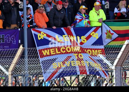 Silverstone, UK. 07th July, 2024. Circuit atmosphere - flag for Lewis Hamilton (GBR) Mercedes AMG F1. 07.07.2024. Formula 1 World Championship, Rd 12, British Grand Prix, Silverstone, England, Race Day. Photo credit should read: XPB/Alamy Live News. Stock Photo