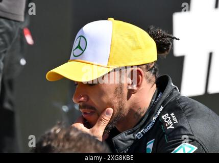 Towcester, UK. 07th July, 2024. Lewis Hamilton celebrates as he wins, Max Verstappen 2nd and Lando Norris 3rd in the Formula 1 Qatar Airways British Grand Prix at Silverstone, Towcester, Northamptonshire, UK. Credit: LFP/Alamy Live News Stock Photo