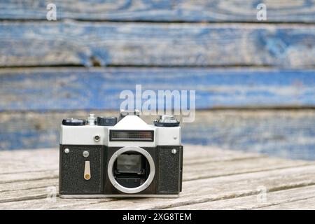 Old analog film DSLR camera without a lens Stock Photo