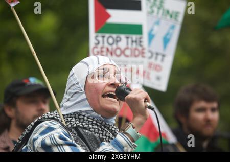 Edinburgh UK, 7th July 2024: A pro-Palestine protestor outside Bute House, official residence of Scotland's First Minister during the visit of Prime minister Sir Keir Starmer. Credit: DB Media Services / Alamy Stock Photo