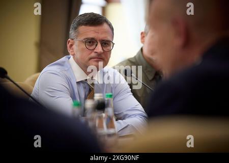 Odesa, Ukraine. 07th July, 2024. Ukrainian Foreign Minister Dmytro Kuleba, right, listens during a bilateral discussion with British Defense Secretary John Healey, and delegations, July 7, 2024 in Odesa, Ukraine. Healey pledged fresh support for Ukraine from the new Labour government in the United Kingdom. Credit: Ukraine Presidency/Ukrainian Presidential Press Office/Alamy Live News Stock Photo