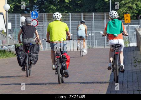 Cyclists with helmet from behind Stock Photo