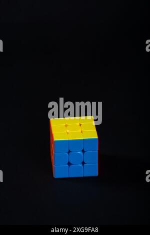 Salvador, Bahia, Brazil - May 15, 2024: Magic cube or Rubiks cube on white background. Invention by Hungarian architect Erno Rubik in 1974 Stock Photo