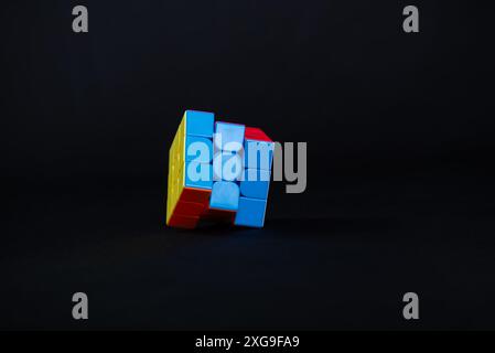 Salvador, Bahia, Brazil - May 15, 2024: Magic cube or Rubiks cube on white background. Invention by Hungarian architect Erno Rubik in 1974 Stock Photo