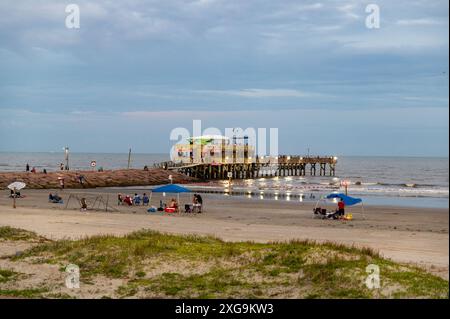 Galveston, USA. 06th July, 2024. Locals and tourists in Galveston, Texas, enjoy the beach, and fishing on a pier on July 6, 2024, taking advantage of the calm before the storm. Tropical Storm Beryl threatens to hit the Texas coast as a Hurricane in the early hours of Monday, July 8, 2024. (Photo by Jennifer Lake/Sipa USA) Credit: Sipa USA/Alamy Live News Stock Photo