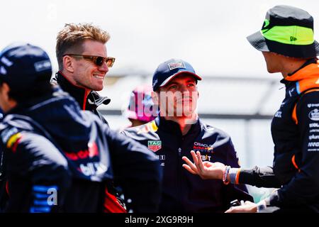Silverstone, UK. 07th July, 2024. Nico Hulkenberg (GER) - MoneyGram Haas F1 Team - Haas VF-24 - Ferrari and Max Verstappen (NED) - Oracle Red Bull Racing - Red Bull RB20 - Honda RBPT during Race Day, on day 4, sunday july 7, 2024 of the formula 1 qatar airways british grand prix 2024, scheduled to take place at the silverstone circuit from July 5 to July 7, 2024. (Photo by Alessio De Marco/Sipa USA) Credit: Sipa USA/Alamy Live News Stock Photo