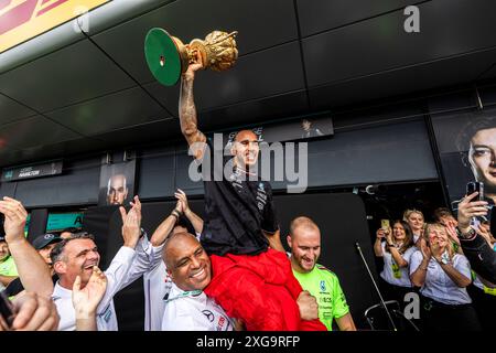Silverstone, UK. 07th July, 2024. Mercedes-AMG Petronas F1 Team celebrating the victory o Lewis Hamilton (GBR) - Mercedes-AMG PETRONAS F1 Team - Mercedes W15 - Mercedes E Performance after the Race on day 4, Sunday july 7, 2024 of the formula 1 qatar airways british grand prix 2024, scheduled to take place at the silverstone circuit from July 5 to July 7, 2024. (Photo by Alessio De Marco/Sipa USA) Credit: Sipa USA/Alamy Live News Stock Photo