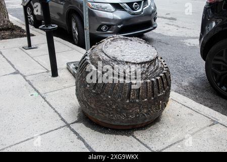 Indigenous contributions bronze sculpture on Peel Street in downtown Montreal, Quebec, Canada Stock Photo