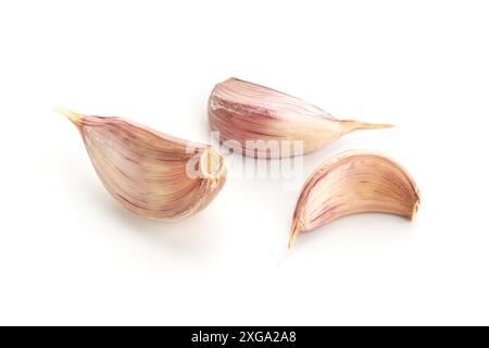 Garlic cloves isolated on white background Stock Photo