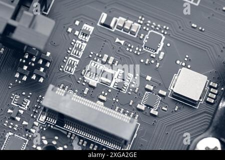 Electronic Circuit Chip of a computer motherboard. Abstract background technology Stock Photo