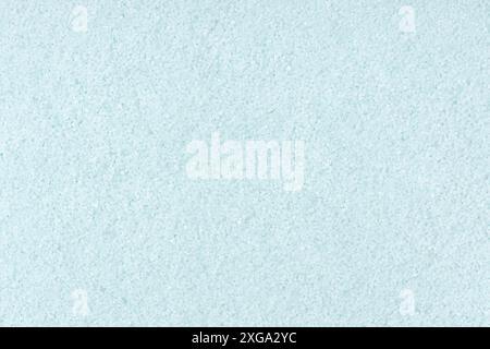 Turquoise colored sand background texture. Full frame Stock Photo