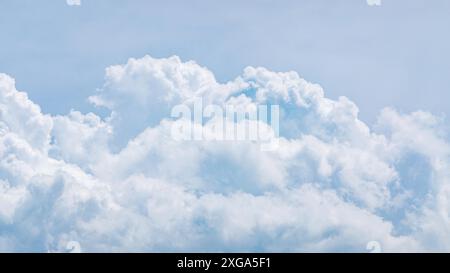 Light blue (cumulus) clouds texture, wide summer sky background Stock Photo