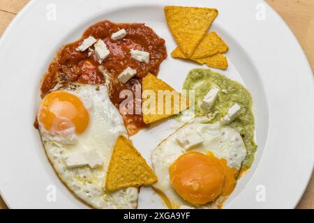 Mexican fried eggs with salsa Stock Photo