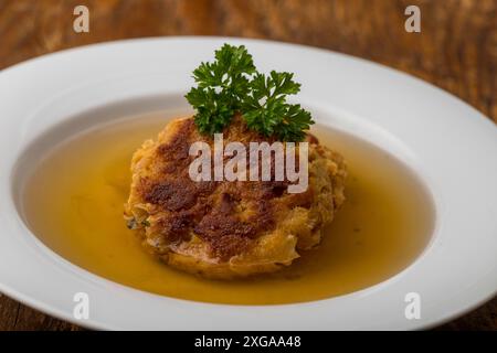 Austrian cheese dumpling in broth Stock Photo