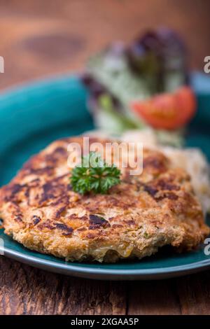 Austrian cheese dumpling with sauerkraut Stock Photo