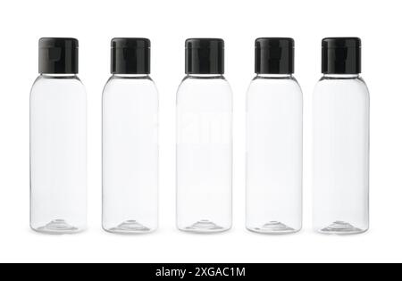 Five Clear Plastic Bottles With Black Caps on a White Background Stock Photo