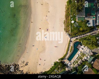 Phuket, Thailand: Aerial top down drone view of the idyllic Kata Noi beach in Phuket by the Andaman sea, a very popular tropical resort island. Stock Photo