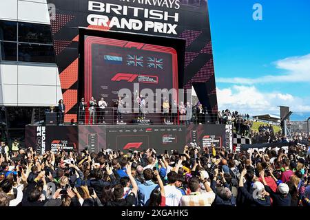 Silverstone. 7th July, 2024. This photo taken on July 7, 2024 shows the awarding ceremony of the Formula 1 British Grand Prix race at the Silverstone Circuit, Britain. Credit: Wu Lu/Xinhua/Alamy Live News Stock Photo