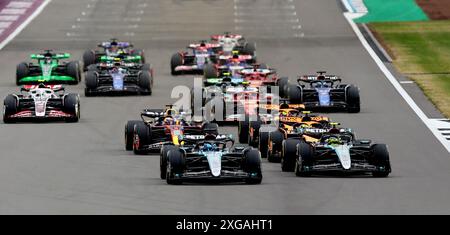 Silverstone, Britain. 7th July, 2024. Drivers compete during the Formula 1 British Grand Prix race at the Silverstone Circuit, Britain, July 7, 2024. Credit: Li Ying/Xinhua/Alamy Live News Stock Photo