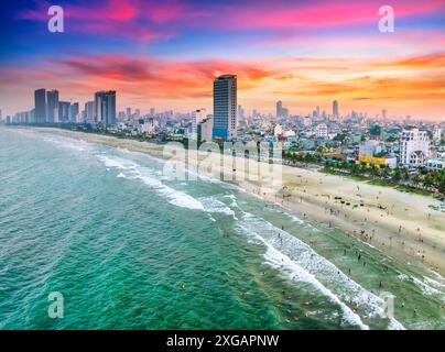 Da Nang, Vietnam - April 15th, 2024: Aerial view of Da Nang beach, Vietnam at sunset sky which is one of the most beautiful beach in the world. Stock Photo