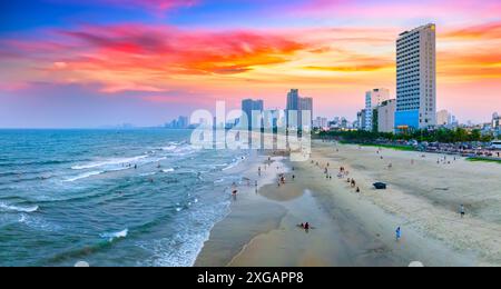 Da Nang, Vietnam - April 15th, 2024: Aerial view of Da Nang beach, Vietnam at sunset sky which is one of the most beautiful beach in the world. Stock Photo