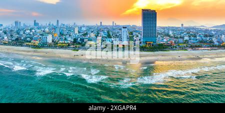 Da Nang, Vietnam - April 15th, 2024: Aerial view of Da Nang beach, Vietnam at sunset sky which is one of the most beautiful beach in the world. Stock Photo