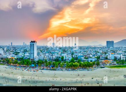 Da Nang, Vietnam - April 15th, 2024: Aerial view of Da Nang beach, Vietnam at sunset sky which is one of the most beautiful beach in the world. Stock Photo