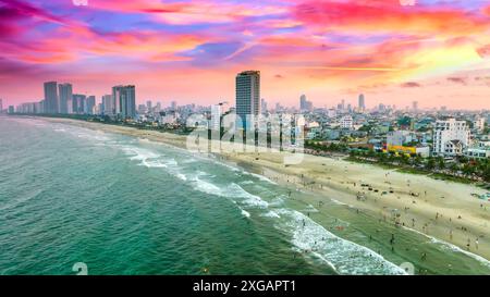 Da Nang, Vietnam - April 15th, 2024: Aerial view of Da Nang beach, Vietnam at sunset sky which is one of the most beautiful beach in the world. Stock Photo