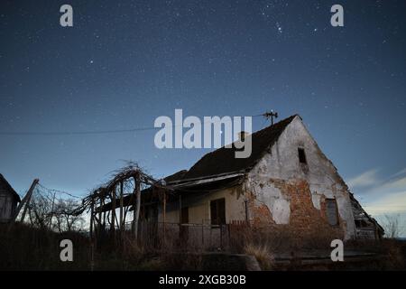 Abandoned farm house against starry night sky, night landscape Stock ...