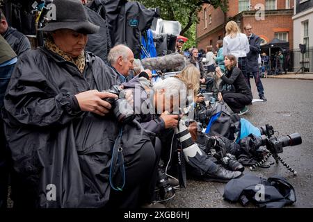 Photographers check their work in Downing Street on the day of the Labour Party's landslide victory in Britain's 2024 general election, and the installation of Sir Keir Starmer as the UK's new Prime Minister, on 5th July 2024, in London, England. Stock Photo