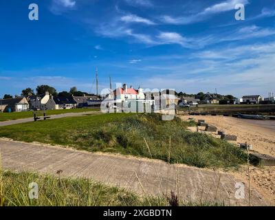 View of the beach at Balintore Harbour near Tain in Scotland on a summer day with blue sky Stock Photo