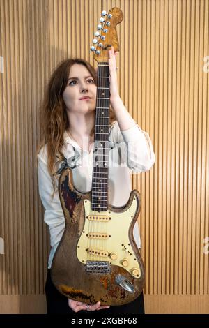 London, UK.  8 July 2024.  The iconic 1961 Fender Stratocaster, (Est. £700,000 - 1,000,000), arguably the most recognisable Stratocaster in rock history, is presented at Bonhams at a preview of ‘The Rory Gallagher Collection’, a selection of guitars, amps and accessories from the life and career of Irish musician and songwriter Rory Gallagher.  Lots will be auctioned on 17 October at Bonhams New Bond Street galleries.  Credit: Stephen Chung / Alamy Live News Stock Photo