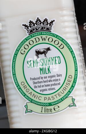 Organic semi-skimmed milk in plastic bottle from the Goodwood Estate Home Farm, farm shop in West Sussex, England, UK Stock Photo