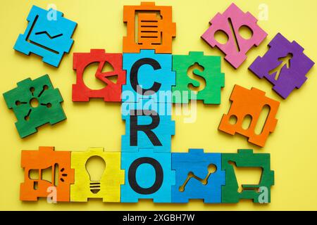 Colored puzzle with abbreviation CRO Conversion Rate Optimization. Stock Photo