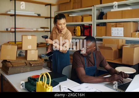 People Working With Goods In Team Stock Photo