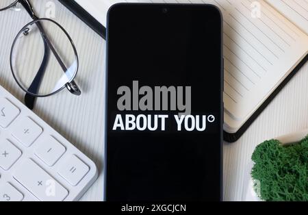 New York, USA - 11 June 2024: About You Logo on Phone Screen, Company Icon. Stock Photo